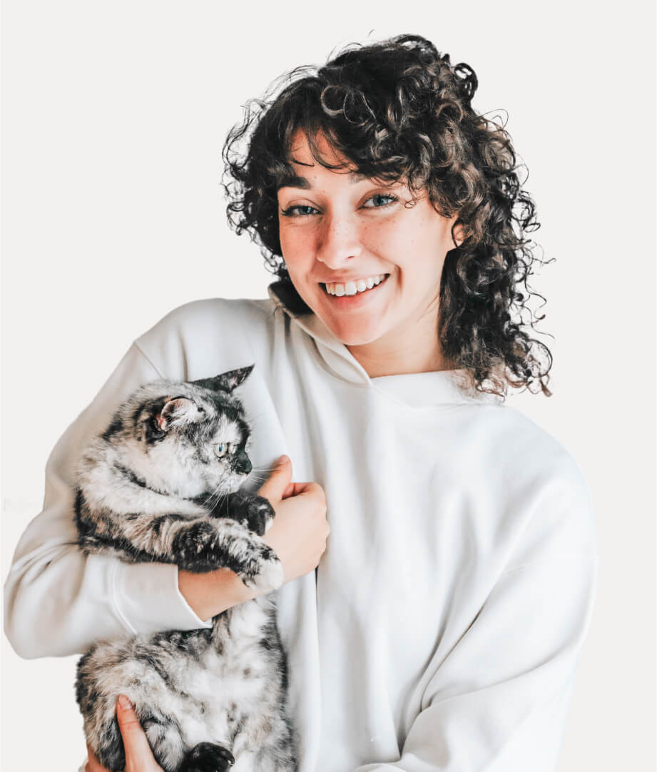 A woman holding her cat